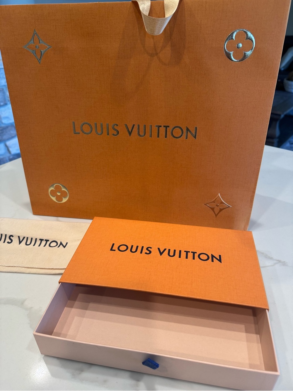 Louis Vuitton box and tote bag